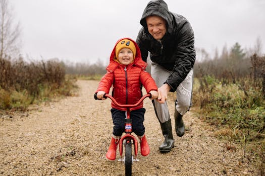 parent helping child with potty training