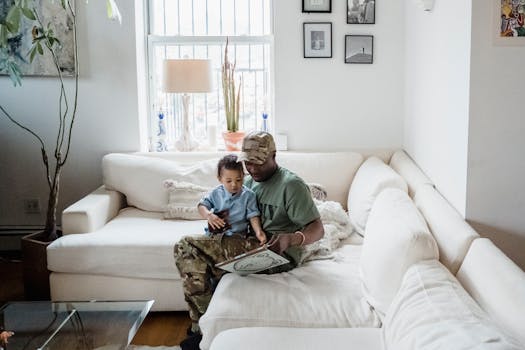 Parent reading to toddler on the potty