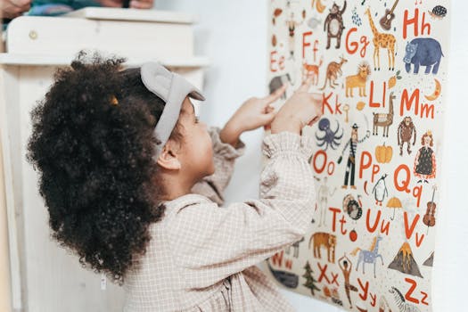 toddler with a potty chart and stickers