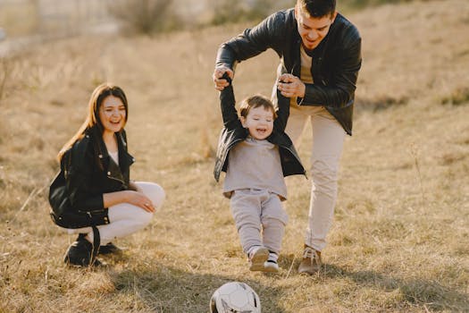 happy toddler sitting on a potty