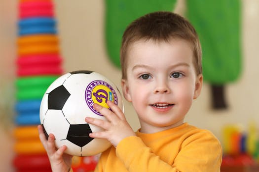 toddler having fun with potty training buddy