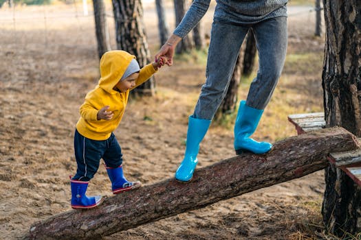 parent helping child with potty training