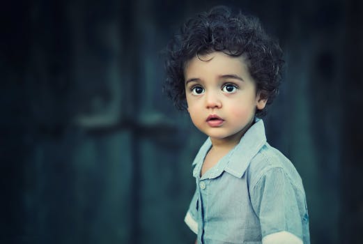 happy toddler with a potty