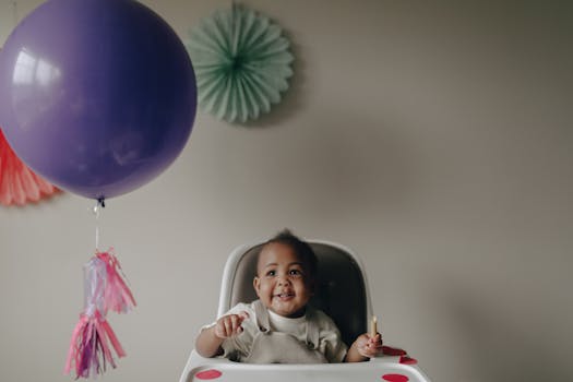 cheerful toddler on a potty chair